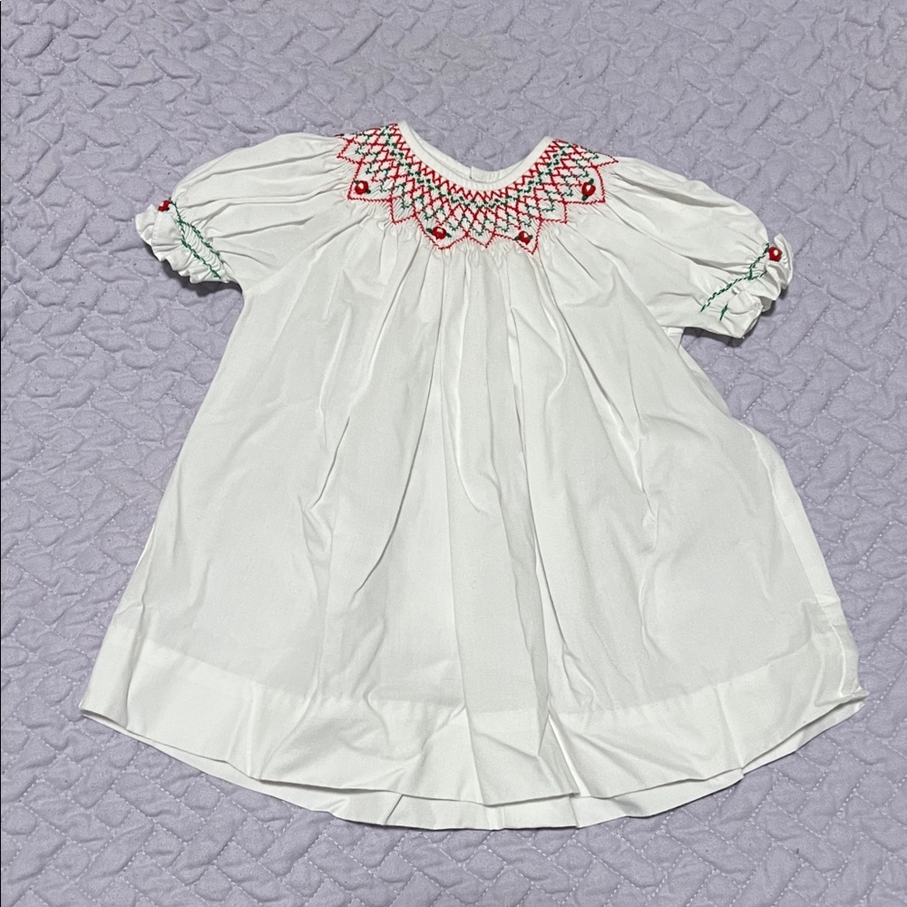 Elegant White Kids bishop style dress with Red and Green Smocking